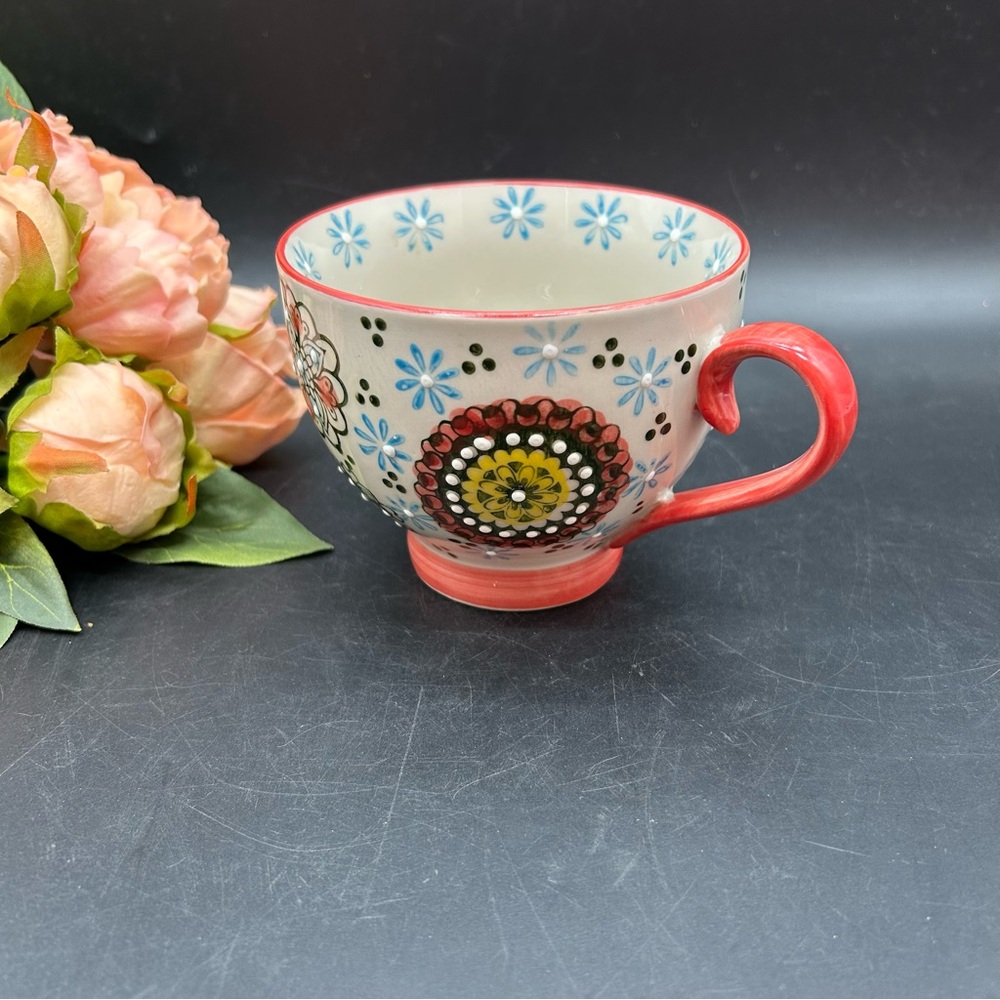 Dutch Wax Raised Design Floral Mug with orange Handle